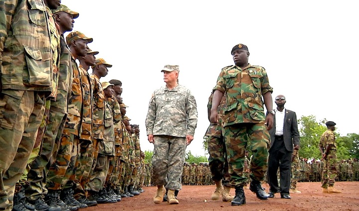 Army Major General David R. Hogg , center, commander of U.S. Army Africa, inspects Sierra Leone troops, May 20, 2012.