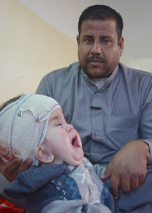 Baby Seif in Fallujah, born with spina bifida. Credit: Donna Mulhearn